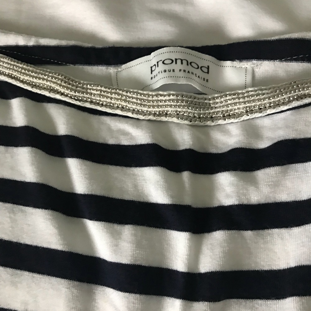 Long sleeved stripped shirt with beaded neckline